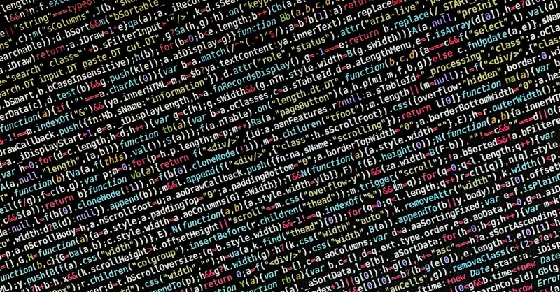 Close-up view of colorful programming code on a screen, ideal for tech and development themes.