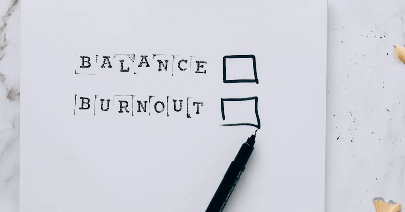 A minimalist image depicting the choice between balance and burnout with checkboxes.